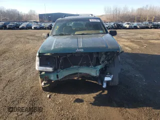 1998 Jeep Grand Cherokee Laredo with VIN 1J4GZ48S4WC239246, listed as a Copart auction lot 86101204 with 0 mi miles and Salvage Title. Bid and sale history available at carsss.com. Image 5.