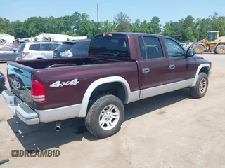 2004 Dodge Dakota SLT with VIN 1D7HG48N24S556431, listed as a IAAI auction lot 42591078 with 213,777 mi miles and . Bid and sale history available at DreamBid. Image 4.