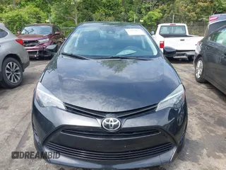 2018 Toyota Corolla L with VIN 2T1BURHE7JC018388, listed as a IAAI auction lot 42102862 with 111,882 mi miles and . Bid and sale history available at DreamBid. Image 12.