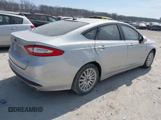 2016 Ford Fusion SE Hybrid with VIN 3FA6P0LU0GR397830, listed as a IAAI auction lot 41785627 with 185,988 mi miles. Bid and sale history available at carsss.com. Image 4.