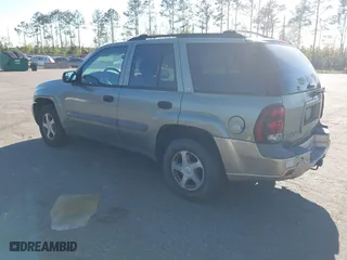 2004 Chevrolet TrailBlazer LS with VIN 1GNDT13S942209802, listed as a IAAI auction lot 41842521 with 197,319 mi miles. Bid and sale history available at carsss.com. Image 3.