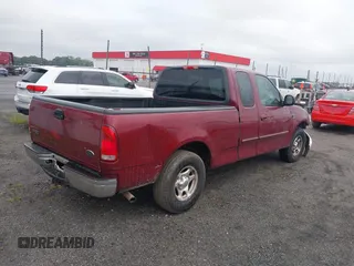 2003 Ford F-150 XL with VIN 1FTRX17W23NA03427, listed as a IAAI auction lot 42335438 with 187,397 mi miles and . Bid and sale history available at DreamBid. Image 4.