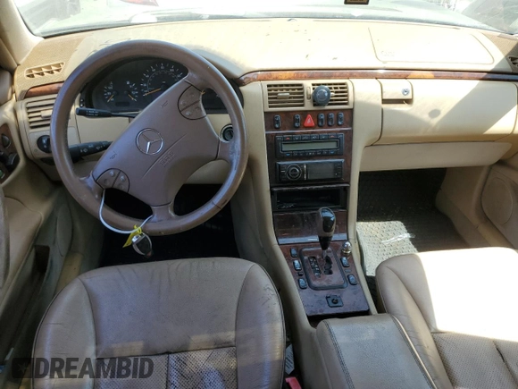 2001 Mercedes-Benz E-Class AWD with VIN WDBJH82J71X051634, listed as a Copart auction lot 51299544 with 286,211 mi miles and Salvage Title. Bid and sale history available at carsss.com. Image 8.