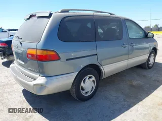 2000 Toyota Sienna LE with VIN 4T3ZF13C2YU293649, listed as a IAAI auction lot 42299543 with 139,504 mi miles and . Bid and sale history available at DreamBid. Image 4.