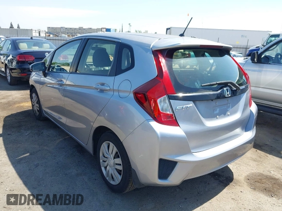 2017 Honda Fit LX with VIN JHMGK5H51HS023212, listed as a IAAI auction lot 42153107 with 106,778 mi miles. Bid and sale history available at carsss.com. Image 3.