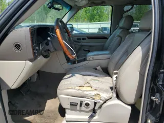 2004 Cadillac Escalade z VIN 1GYEK63N54R256740, wystawiony jako Copart lot #58633795 z przebiegiem 245 335 mil mil oraz Czysty tytuł • Clean title. Historia ofert i sprzedaży dostępna na DreamBid. Obrazek 7.