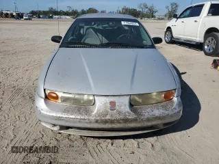 2000 Saturn SL with VIN 1G8ZH5289YZ253710, listed as a Copart auction lot 77904954 with Not provided miles and Non repairable. Bid and sale history available at DreamBid. Image 5.