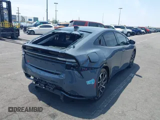 2024 Toyota Prius SE z VIN JTDACACU1R3033326, wystawiony jako IAAI lot #42174204 z przebiegiem 11 273 mil mil oraz . Historia ofert i sprzedaży dostępna na DreamBid. Obrazek 4.