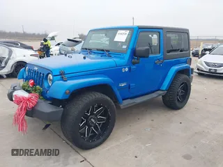 2014 Jeep Wrangler Arctic z VIN 1C4GJWBG3EL313350, wystawiony jako IAAI lot #41442520 z przebiegiem Nie podano mil oraz . Historia ofert i sprzedaży dostępna na DreamBid. Obrazek 17.