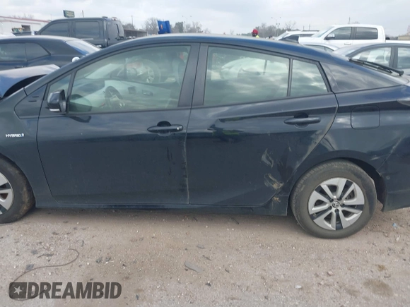 2017 Toyota Prius Two with VIN JTDKBRFU2H3052287, listed as a IAAI auction lot 41507689 with 82,205 mi miles and . Bid and sale history available at carsss.com. Image 14.