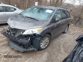 2015 Toyota Sienna Ltd with VIN 5TDDK3DCXFS100341, listed as a IAAI auction lot 41245558 with 114,854 mi miles. Bid and sale history available at carsss.com. Image 2.