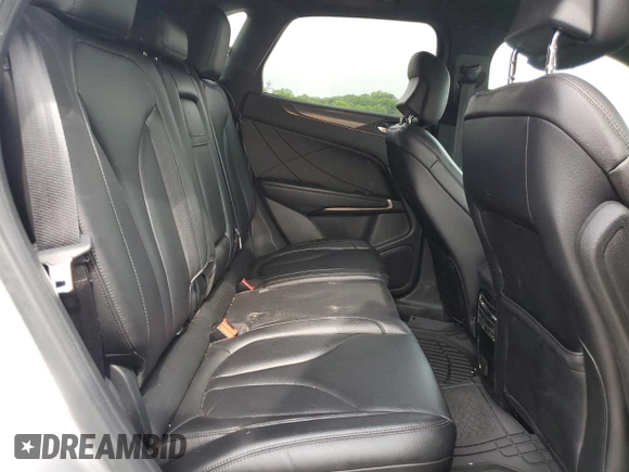 2017 Lincoln MKC Premiere with VIN 5LMCJ1C91HUL32617, listed as a Copart auction lot 57444215 with 106,285 mi miles and Salvage title. Bid and sale history available at DreamBid. Image 11.