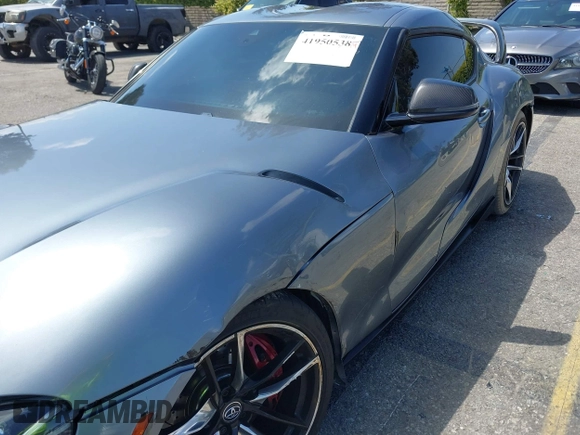 2022 Toyota Supra 3.0 z VIN WZ1DB0C03NW050498, wystawiony jako IAAI lot #41950538 z przebiegiem 42 449 mil mil oraz . Historia ofert i sprzedaży dostępna na DreamBid. Obrazek 17.