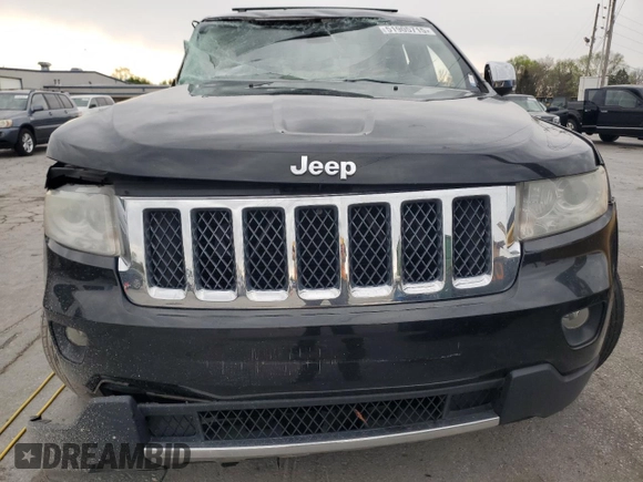2012 Jeep Grand Cherokee Overland with VIN 1C4RJECT7CC311578, listed as a Copart auction lot 51905715 with 172,980 mi miles and Salvage Title. Bid and sale history available at carsss.com. Image 5.