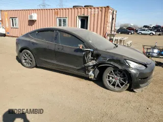 2018 Tesla Model 3 Long Range Battery with VIN 5YJ3E1EA5JF038770, listed as a Copart auction lot 48828985 with 116,641 mi miles and Salvage Title. Bid and sale history available at DreamBid. Image 4.