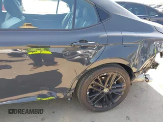 2025 Toyota Camry LE z VIN 4T1DAACK7SU531768, wystawiony jako IAAI lot #42187559 z przebiegiem 26 348 mil mil oraz . Historia ofert i sprzedaży dostępna na DreamBid. Obrazek 19.