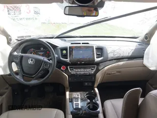 2016 Honda Pilot Touring with VIN 5FNYF6H90GB102403, listed as a IAAI auction lot 42007825 with 69,450 mi miles. Bid and sale history available at carsss.com. Image 5.
