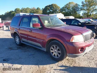 2004 Lincoln Navigator Luxury with VIN 5LMFU27R64LJ13317, listed as a IAAI auction lot 40598909 with 240,131 mi miles. Bid and sale history available at carsss.com. Image 1.