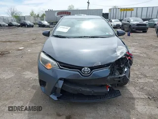 2015 Toyota Corolla L with VIN 2T1BURHE1FC381115, listed as a IAAI auction lot 42088980 with 203,493 mi miles and . Bid and sale history available at DreamBid. Image 11.