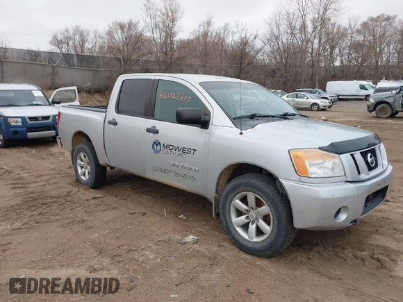 2012 Nissan Titan S with VIN 1N6AA0EJXCN310874, listed as a IAAI auction lot 42022787 with 162,317 mi miles. Bid and sale history available at carsss.com. Image 1.