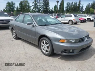 2002 Mitsubishi Galant ES z VIN 4A3AA46H62E018432, wystawiony jako IAAI lot #42237117 z przebiegiem 85 886 mil mil oraz . Historia ofert i sprzedaży dostępna na DreamBid. Obrazek 1.