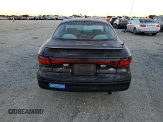 1998 Ford Escort z VIN 3FALP1131WR101490, wystawiony jako Copart lot #74065584 z przebiegiem 144 659 mil mil oraz Szkoda całkowita • Salvage title. Historia ofert i sprzedaży dostępna na DreamBid. Obrazek 6.