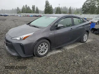 2021 Toyota Prius L Eco z VIN JTDKAMFU0M3149424, wystawiony jako Copart lot #58076985 z przebiegiem 116 646 mil mil oraz Szkoda całkowita • Salvage title. Historia ofert i sprzedaży dostępna na DreamBid. Obrazek 1.