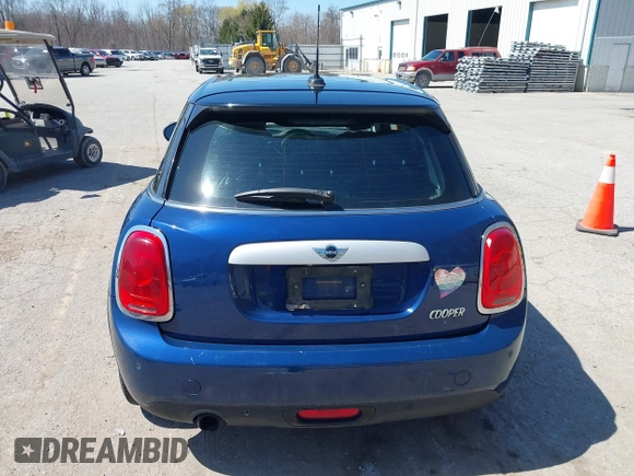 2015 MINI Hardtop 4 Door z VIN WMWXS5C58FT829805, wystawiony jako IAAI lot #42023026 z przebiegiem 141 330 mil mil oraz . Historia ofert i sprzedaży dostępna na DreamBid. Obrazek 16.