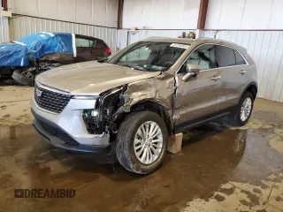 2024 Cadillac XT4 AWD Luxury with VIN 1GYFZBR48RF242850, listed as a Copart auction lot 52290865 with 1,524 mi miles and Salvage Title. Bid and sale history available at carsss.com. Image 1.