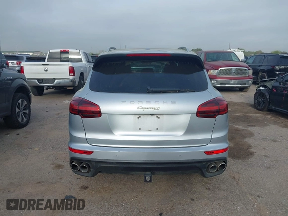 2016 Porsche Cayenne S E-Hybrid with VIN WP1AE2A26GLA59496, listed as a IAAI auction lot 41884022 with 85,386 mi miles and . Bid and sale history available at DreamBid. Image 16.