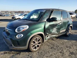 2014 FIAT 500L Trekking with VIN ZFBCFADH4EZ003989, listed as a Copart auction lot 83334354 with 90,261 mi miles and Salvage Title. Bid and sale history available at carsss.com. Image 1.