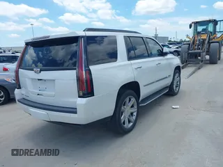 2017 Cadillac Escalade Luxury z VIN 1GYS3BKJ2HR145088, wystawiony jako IAAI lot #41517213 z przebiegiem 52 329 mil mil oraz . Historia ofert i sprzedaży dostępna na DreamBid. Obrazek 4.