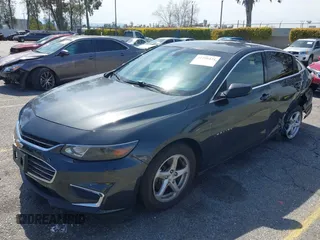 2018 Chevrolet Malibu LS with VIN 1G1ZB5ST2JF231804, listed as a IAAI auction lot 41756421 with 128,447 mi miles and . Bid and sale history available at DreamBid. Image 2.