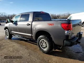 2012 Toyota Tundra 4WD Truck with VIN 5TFDW5F10CX233367, listed as a Copart auction lot 45713585 with 199,362 mi miles and Salvage Title. Bid and sale history available at carsss.com. Image 2.