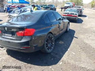 2014 BMW 3 Series 328i xDrive with VIN WBA3B5G59ENS09377, listed as a IAAI auction lot 41921377 with 102,160 mi miles. Bid and sale history available at carsss.com. Image 4.
