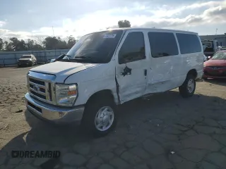 2011 Ford Econoline Passenger XL with VIN 1FBNE3BL0BDB17271, listed as a Copart auction lot 43022735 with 184,054 mi miles and Salvage Title. Bid and sale history available at carsss.com. Image 1.