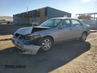 2002 Mazda 626 LX with VIN 1YVGF22C125279863, listed as a Copart auction lot 87103664 with 139,633 mi miles and Salvage Title. Bid and sale history available at carsss.com. Image 1.