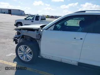2019 Volkswagen Atlas SEL with VIN 1V2MR2CA2KC597854, listed as a IAAI auction lot 41924853 with 96,847 mi miles and . Bid and sale history available at DreamBid. Image 19.