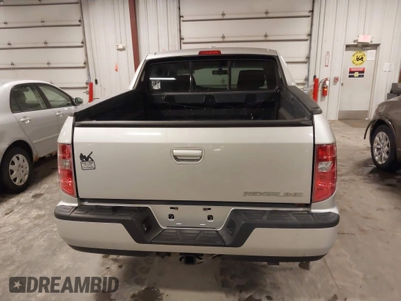 2009 Honda Ridgeline RTL with VIN 2HJYK16519H000129, listed as a IAAI auction lot 41891810 with 186,124 mi miles. Bid and sale history available at carsss.com. Image 16.