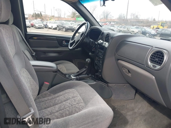 2004 GMC Envoy SLE with VIN 1GKDT13S142219365, listed as a IAAI auction lot 41612594 with 72,292 mi miles. Bid and sale history available at carsss.com. Image 5.