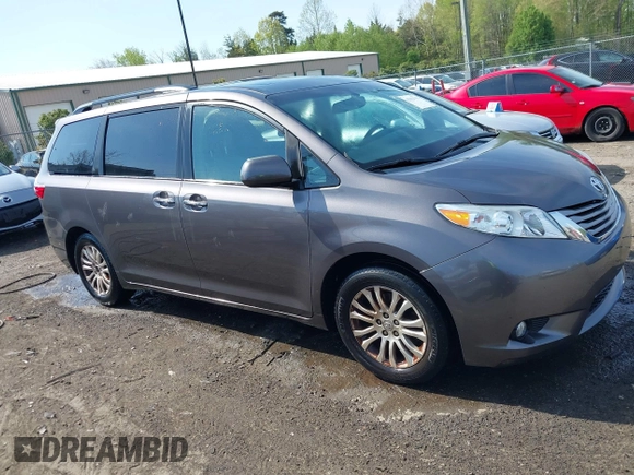 2015 Toyota Sienna XLE with VIN 5TDYK3DC9FS685768, listed as a IAAI auction lot 42062942 with 132,242 mi miles. Bid and sale history available at carsss.com. Image 13.