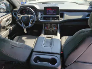 2023 Chevrolet Suburban LS with VIN 1GNSCBKD1PR132161, listed as a Copart auction lot 70649614 with 24,850 mi miles and Salvage Title. Bid and sale history available at DreamBid. Image 8.