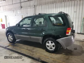 2002 Ford Escape XLS Value with VIN 1FMYU01B32KC48043, listed as a Copart auction lot 63011005 with 167,185 mi miles and Salvage title. Bid and sale history available at DreamBid. Image 2.
