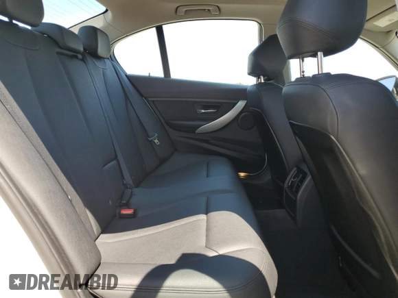 2014 BMW 3 Series 320i with VIN WBA3B1C55EK133687, listed as a Copart auction lot 63049945 with 95,604 mi miles and Salvage title. Bid and sale history available at DreamBid. Image 10.