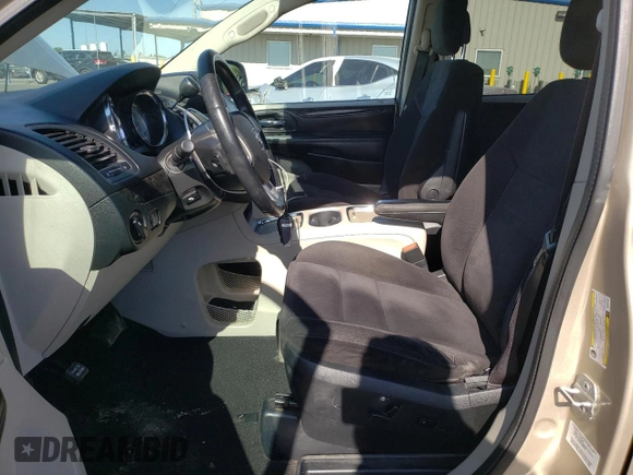 2014 Dodge Grand Caravan SXT z VIN 2C4RDGCG6ER427418, wystawiony jako Copart lot #58804395 z przebiegiem 154 524 mil mil oraz Tytuł czysty. Historia ofert i sprzedaży dostępna na DreamBid. Obrazek 7.