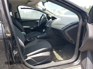 2012 Ford Focus SE with VIN 1FAHP3F21CL390012, listed as a IAAI auction lot 42634521 with 214,617 mi miles and . Bid and sale history available at DreamBid. Image 5.