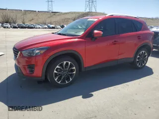 2016 Mazda CX-5 Grand Touring with VIN JM3KE4DY8G0857296, listed as a Copart auction lot 52315945 with 83,382 mi miles and Salvage Title. Bid and sale history available at DreamBid. Image 1.