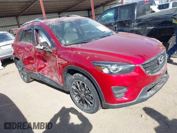 2016 Mazda CX-5 Grand Touring with VIN JM3KE4DY0G0709563, listed as a IAAI auction lot 41886956 with 156,769 mi miles. Bid and sale history available at carsss.com. Image 1.