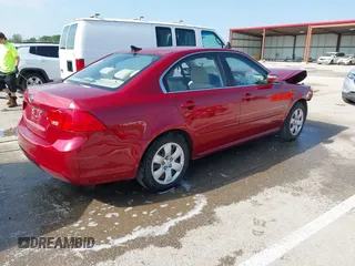 2010 Kia Optima LX z VIN KNAGG4A88A5435095, wystawiony jako IAAI lot #42085605 z przebiegiem 188 685 mil mil oraz . Historia ofert i sprzedaży dostępna na DreamBid. Obrazek 4.