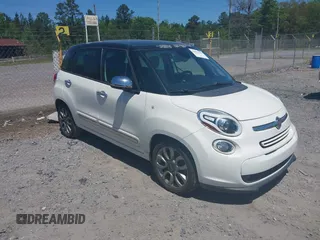 2014 FIAT 500L Lounge with VIN ZFBCFACH8EZ005469, listed as a IAAI auction lot 42002547 with 114,769 mi miles. Bid and sale history available at carsss.com. Image 1.